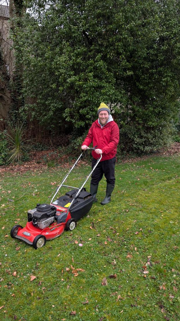 Ryan cutting the grass